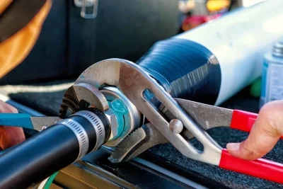 Pipe repair service using professional plumbing tools in Sarasota, Florida